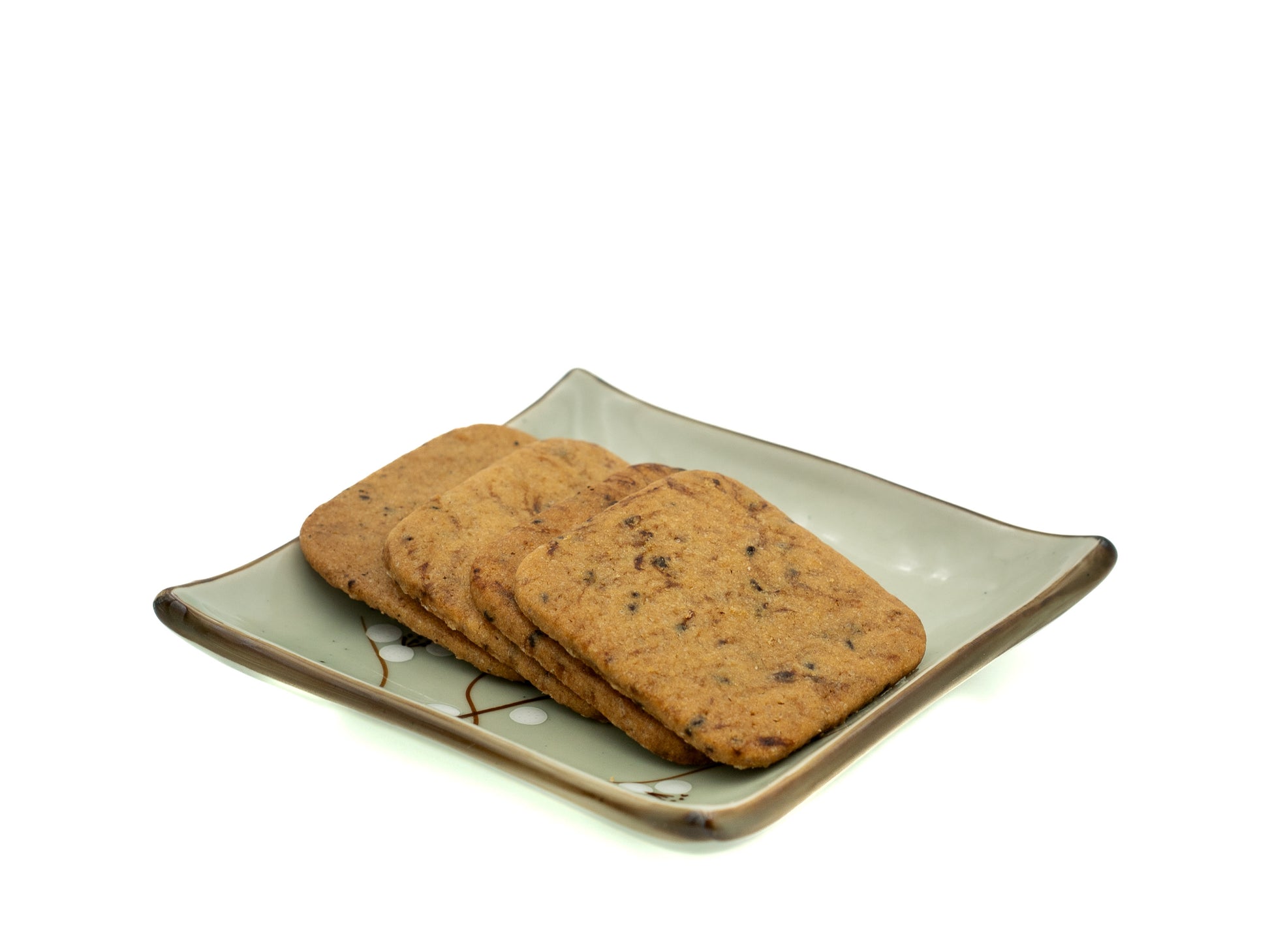 Coffee cookies on a decorative plate with a white background